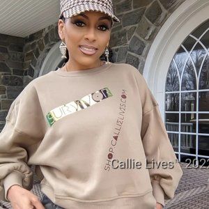 8) Miz Survivor: Chameleon Foil Balloon Sleeve Cropped Khaki Sweatshirt M/L